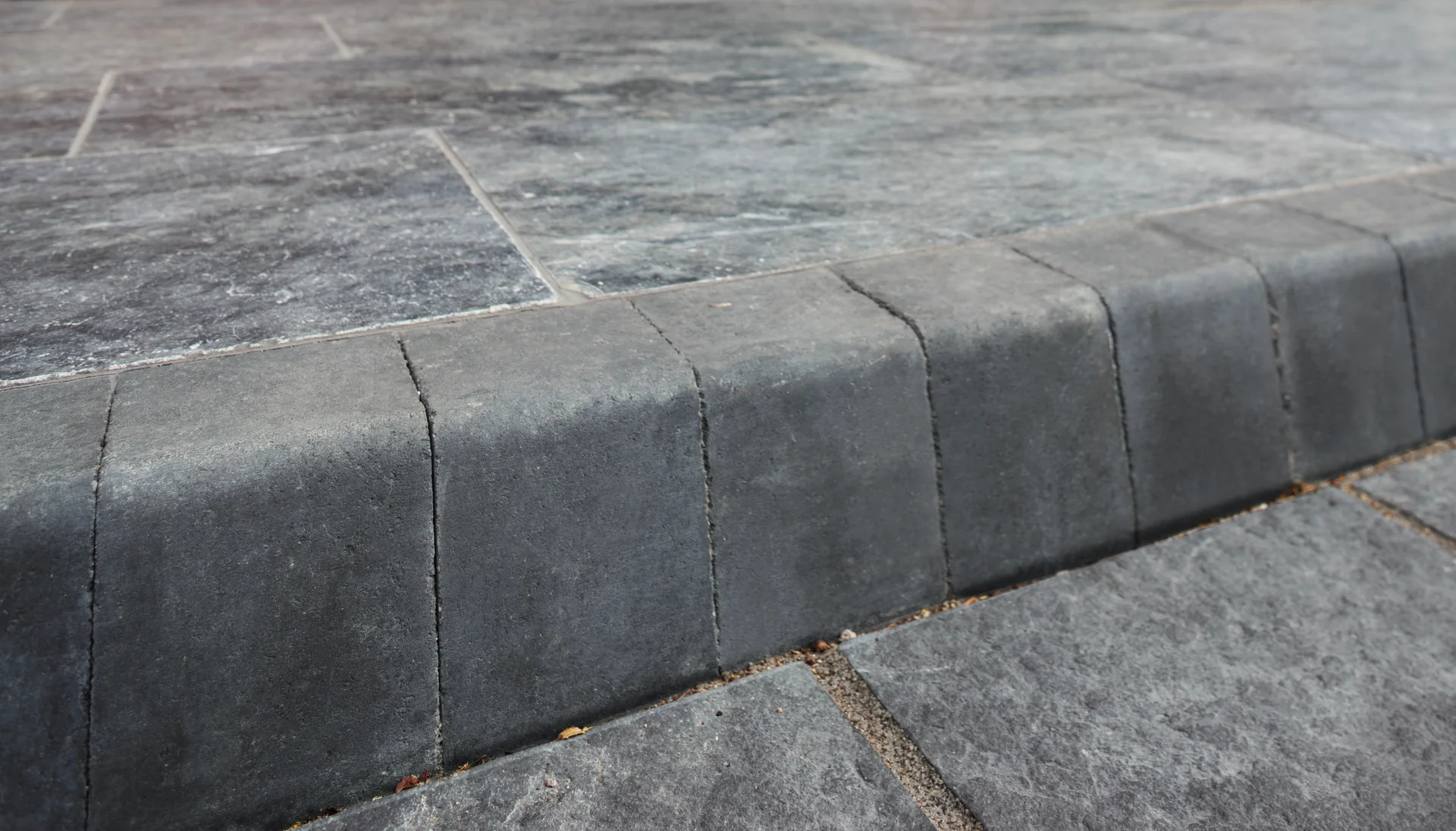 Paved patio garden with stone landscaping