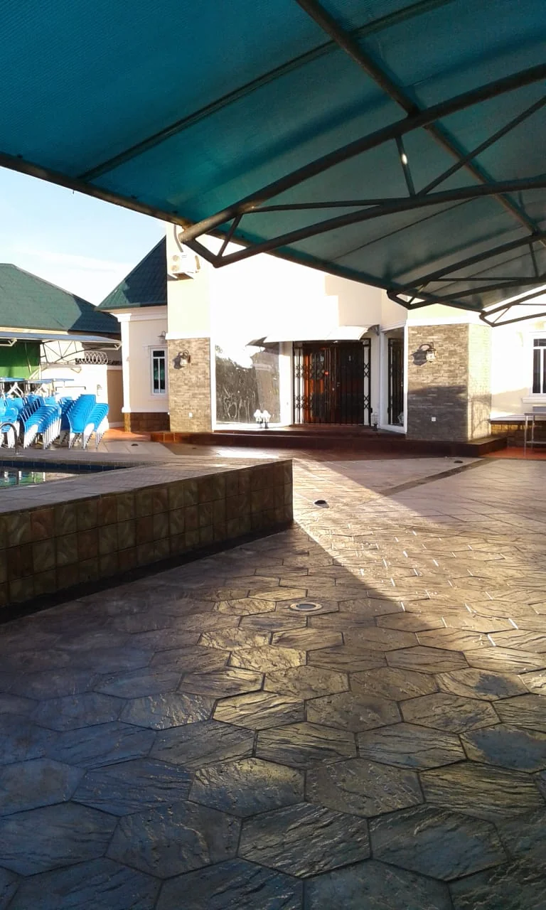Outdoor patio paving stones with garden landscaping